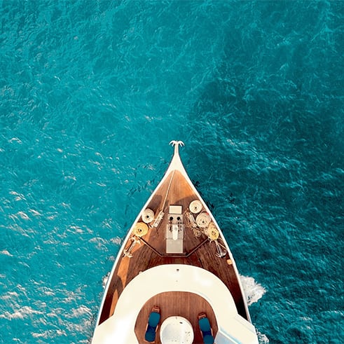 The bough of a Super Yacht from above