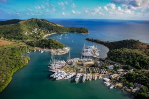 Aerial view of a Caribbean marina with superyachts